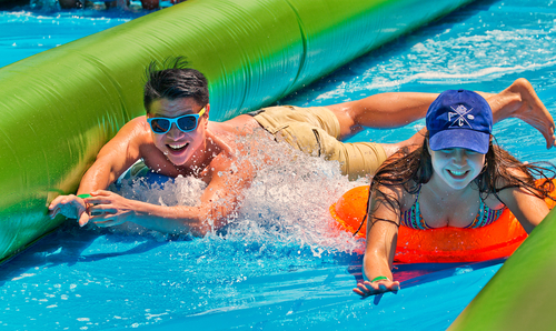 Couple in adult water slide